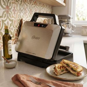 sanduicheira_eletrica_multiuso_inox_oster--1-